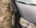 Ford Laser   2004 - Bán xe Ford Laser đời 2004, màu đen, nhập khẩu  