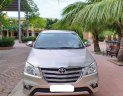 Toyota Innova 2.0E 2014 - Bán Toyota Innova 2.0E đời 2014, màu vàng, chính chủ, giá 385tr