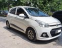 Hyundai Grand i10 AT 2015 - Xe Hyundai Grand i10 AT đời 2015, màu trắng, nhập khẩu chính hãng, còn mới