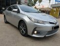 Toyota Corolla altis G 2018 - Cần bán xe Toyota Altis 1.8G AT 2018 màu bạc, xe đi ít giữ kĩ chính hãng Toyota Sure