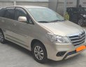 Toyota Innova E 2015 - Bán xe Toyota Innova 2.0E 2015 màu nâu vàng, xe đẹp đi kĩ chính hãng Toyota Sure