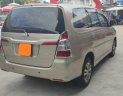 Toyota Innova E 2015 - Bán xe Toyota Innova 2.0E 2015 màu nâu vàng, xe đẹp đi kĩ chính hãng Toyota Sure