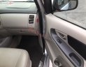 Toyota Innova 2014 - Cần bán Toyota Innova sản xuất 2014, màu bạc xe gia đình