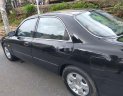 Mazda 626 1994 - Cần bán lại xe Mazda 626 1994, màu đen, giá chỉ 65 triệu