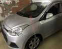 Hyundai Grand i10  1.0 MT Base  2015 - Bán Hyundai Grand i10 1.0 MT Base sản xuất 2015, màu bạc, xe nhập còn mới