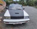 Nissan Bluebird 1986 - Bán xe Nissan Bluebird đời 1986, hai màu đen trắng, nhập khẩu giá cạnh tranh