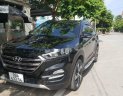 Hyundai Tucson     2019 - Cần bán gấp Hyundai Tucson sản xuất 2019, màu đen còn mới