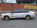 Nissan Bluebird 1986 - Bán xe Nissan Bluebird đời 1986, hai màu đen trắng, nhập khẩu giá cạnh tranh