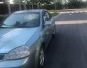 Daewoo Lacetti 2005 - Cần bán gấp Daewoo Lacetti 2005, màu bạc