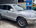 Hyundai Santa Fe   Gold   2004 - Bán Hyundai Santa Fe Gold đời 2004, màu bạc, xe nhập số tự động