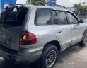 Hyundai Santa Fe   Gold   2004 - Bán Hyundai Santa Fe Gold đời 2004, màu bạc, xe nhập số tự động