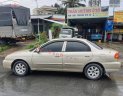 Kia Spectra   1.6 MT  2004 - Xe Kia Spectra 1.6 MT sản xuất năm 2004, màu vàng còn mới, 90 triệu