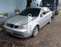 Daewoo Lacetti 2005 - Cần bán Daewoo Lacetti năm sản xuất 2005, màu bạc số sàn, giá chỉ 99 triệu