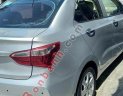 Hyundai Grand i10 2016 - Cần bán gấp Hyundai Grand i10 đời 2016, màu bạc xe gia đình