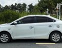 Toyota Vios   J   2014 - Cần bán Toyota Vios J đời 2014, màu trắng còn mới, giá tốt