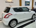 Suzuki Swift 2015 - Cần bán Suzuki Swift sản xuất 2015, màu trắng chính chủ, giá 330tr