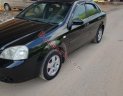 Daewoo Lacetti 2010 - Cần bán xe Daewoo Lacetti sản xuất 2010, màu đen, 144tr