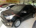 Hyundai Grand i10 2015 - Cần bán lại xe Hyundai Grand i10 2015, màu đen còn mới, 275tr