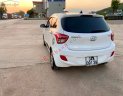 Hyundai Grand i10 2014 - Bán Hyundai Grand i10 năm sản xuất 2014, màu trắng, nhập khẩu nguyên chiếc còn mới, giá chỉ 305 triệu