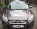 Ford Focus Titanium 2013 - Cần bán lại xe Ford Focus Titanium năm 2013, màu nâu xe gia đình