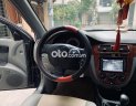 Daewoo Lacetti 2010 - Cần bán lại xe Daewoo Lacetti sản xuất năm 2010, màu đen, 165 triệu