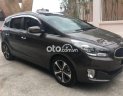 Kia Rondo 2015 - Bán Kia Rondo năm 2015, màu nâu, 495tr