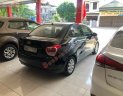 Hyundai Grand i10 2015 - Cần bán lại xe Hyundai Grand i10 2015, màu đen còn mới, 275tr