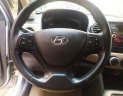 Hyundai Grand i10 2015 - Cần bán gấp Hyundai Grand i10 sản xuất năm 2015, màu bạc, nhập khẩu