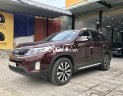 Kia Sorento 2016 - Cần bán xe Kia Sorento sản xuất năm 2016, màu đỏ còn mới, giá tốt