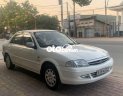 Ford Laser Deluxe 2000 - Cần bán gấp Ford Laser Deluxe sản xuất 2000, màu trắng, số sàn