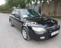 Mazda 323 2004 - Cần bán lại xe Mazda 323 sản xuất năm 2004, màu đen, giá 150tr