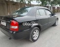 Mazda 323 2004 - Cần bán lại xe Mazda 323 sản xuất năm 2004, màu đen, giá 150tr