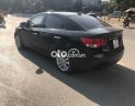 Kia Forte  Sli  2009 - Cần bán Kia Forte Sli năm 2009, màu đen, nhập khẩu số tự động