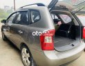 Kia Carens 2009 - Cần bán Kia Carens 2.0 MT đời 2009, màu xám còn mới