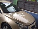 Chevrolet Cruze MT 2012 - Cần bán gấp Chevrolet Cruze MT đời 2012, màu nâu  