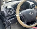 Kia Carens 2009 - Cần bán Kia Carens 2.0 MT đời 2009, màu xám còn mới