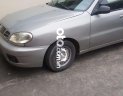 Daewoo Lanos 2004 - Bán ô tô Daewoo Lanos MT đời 2004, màu bạc