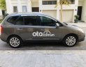 Kia Carens MT 2013 - Cần bán Kia Carens MT đời 2013, màu xám còn mới, 262 triệu