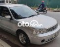 Ford Laser 2004 - Cần bán lại xe Ford Laser 1.6MT đời 2004, màu bạc, giá 130tr