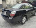 Buick   1.8 AT 2009 - Bán xe Buick Excelle 1.8 AT đời 2009, màu đen, nhập khẩu 