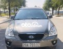 Kia Carens MT 2013 - Cần bán Kia Carens MT đời 2013, màu xám còn mới, 262 triệu