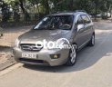 Kia Carens 2009 - Cần bán Kia Carens 2.0 MT đời 2009, màu xám còn mới