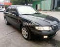 Mazda 626 MT 2001 - Bán Mazda 626 MT đời 2001, màu đen, nhập khẩu nguyên chiếc, giá chỉ 125 triệu