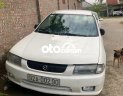 Mazda 323 MT 2000 - Bán Mazda 323 MT năm 2000, màu trắng, nhập khẩu nguyên chiếc, giá tốt