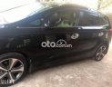 Kia Rondo AT 2016 - Bán Kia Rondo AT sản xuất năm 2016, màu đen xe gia đình