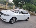 Kia Forte MT 2009 - Bán Kia Forte MT sản xuất năm 2009, màu trắng, nhập khẩu nguyên chiếc