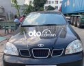 Daewoo Lacetti EX 1.6 MT 2005 - Cần bán lại xe Daewoo Lacetti EX 1.6 MT sản xuất 2005, màu đen, 135 triệu