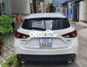 Mazda 3  1.5AT  2016 - Cần bán lại xe Mazda 3 1.5AT năm sản xuất 2016, màu trắng