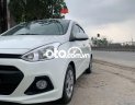 Hyundai Premio MT  2015 - Cần bán gấp Hyundai Grand i10 MT sản xuất năm 2015, màu trắng, xe nhập