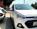 Hyundai Premio MT 2014 - Cần bán gấp Hyundai Grand i10 MT năm sản xuất 2014, màu trắng